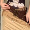تنورة ذات ثنيات غير منتظمة على طراز الطين الأمريكي القديم