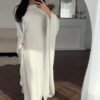 فستان عصري برقبة دائرية بلون سادة