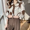 قميص نسائي بأكمام طويلة مطبوع عليه مزاج