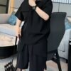 طقم مكون من قطعتين يتكون من تي شيرت وشورت وأكمام قصيرة