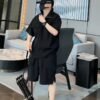 طقم مكون من قطعتين يتكون من تي شيرت وشورت وأكمام قصيرة