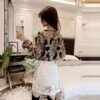 بلوزة نسائية بأكمام طويلة مزينة بالترتر وخرز مطرز