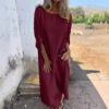 بدلة طويلة فضفاضة غير منتظمة بتصميم أزرار معدنية ورقبة دائرية وقميص بأكمام طويلة وبنطلون مستقيم وبنطلون واسع الساق من ملابس النساء