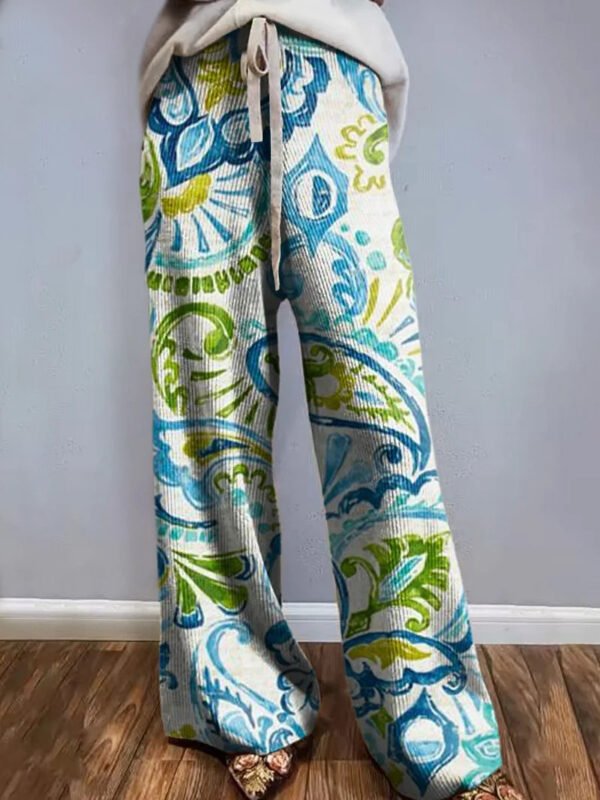 بنطلون رياضي واسع الساق مطبوع عليه شعار أوروبي وأمريكي