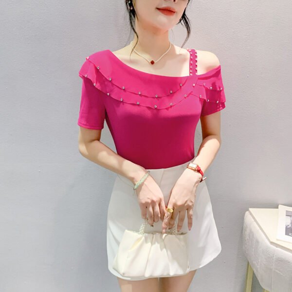 بلوزة فيلامنتيشن رياضية بكتفين واكمام قصيرة ومزينة بكشكشة