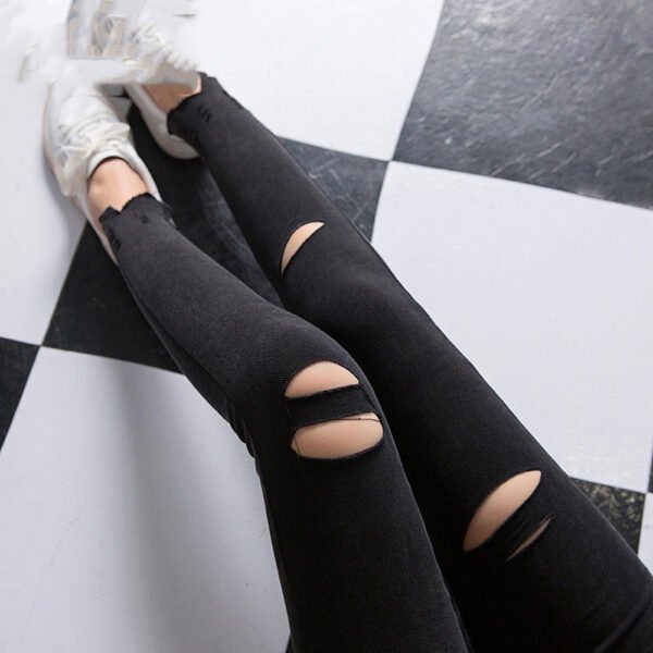 بنطلون جينز كبير الحجم بجيوب خارجية ومغسول بالرمل