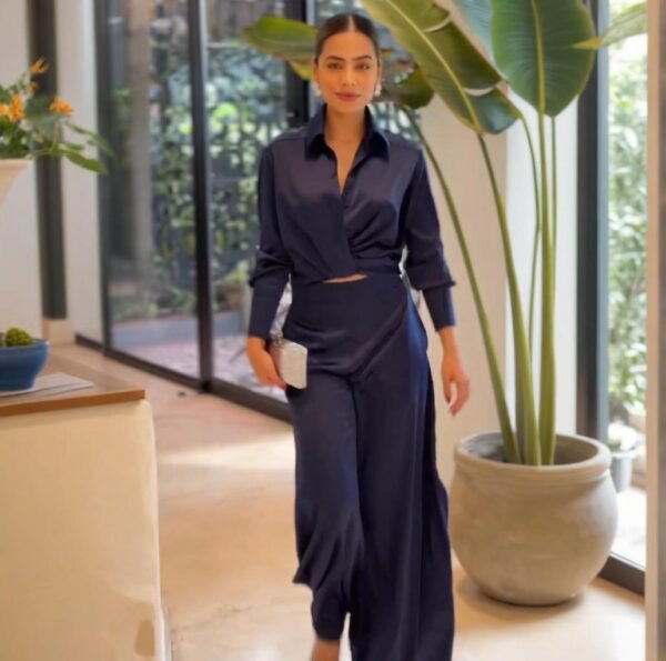 بدلة نسائية أنيقة فضفاضة ذات جزء علوي رائع وبنطلون واسع الساق