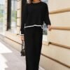 c5e4b145-b116-437f-9ddd-9e0a052f8dd3.jpg طقم نسائي محبوك مكون من قطعتين، بأكمام طويلة وجزء علوي فضفاض وبنطال واسع الساق