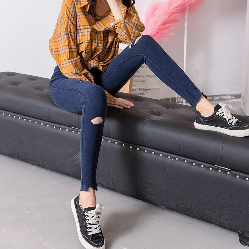 بنطلون جينز كبير الحجم بجيوب خارجية ومغسول بالرمل