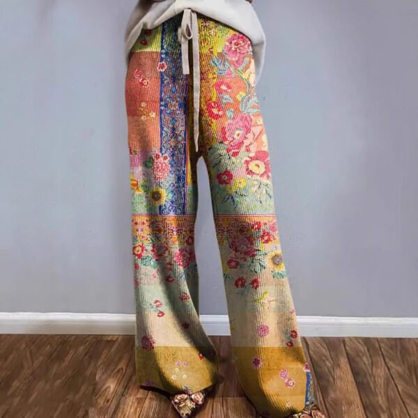 بنطلون رياضي واسع الساق مطبوع عليه شعار أوروبي وأمريكي