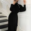 f873f77e-78b5-4996-a67b-f67500da3754.jpg فستان محبوك بأكمام طويلة أسفل الركبة