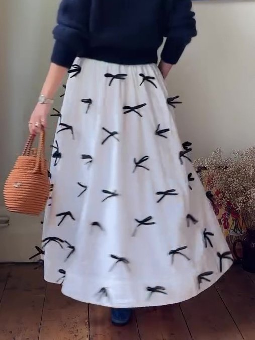 تنورة ضيقة مع فيونكة وخصر حر