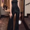 طقم توب أسود وبنطلون عالي الخصر