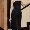 طقم توب أسود وبنطلون عالي الخصر