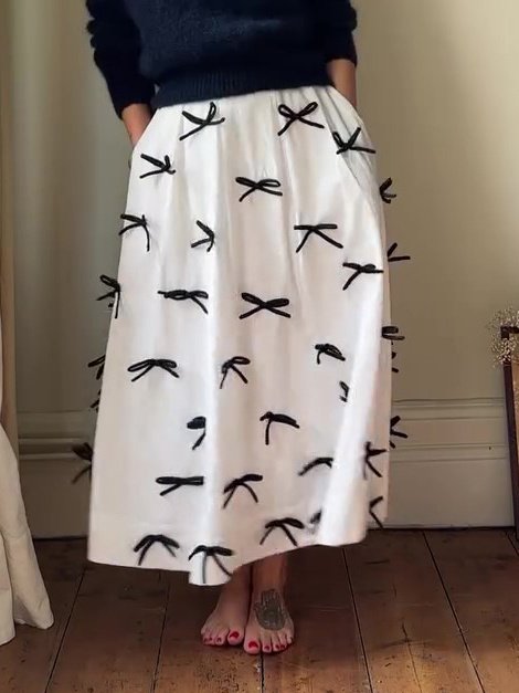 تنورة ضيقة مع فيونكة وخصر حر