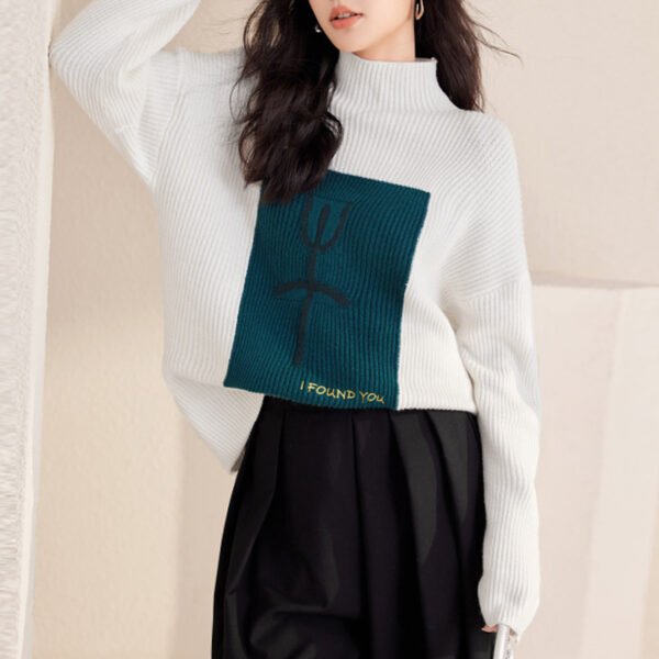 سترة فضفاضة محبوكة بألوان متباينة مناسبة لفصل الخريف والشتاء