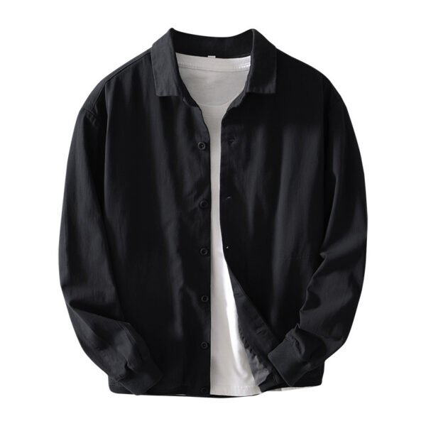 3ccbe2c9-4184-4be3-806c-fa3ced601a37.jpg زي بيسبول فضفاض بتصميم جيب كلاسيكي