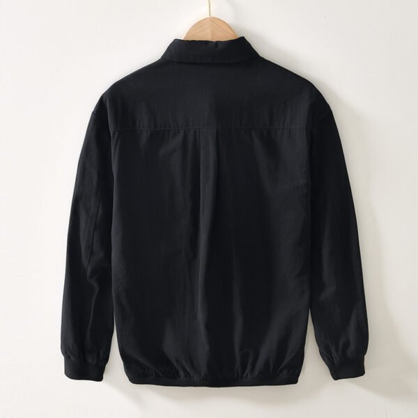 6b472b6c-487c-4fe9-b1f8-07cda38c917e.jpg زي بيسبول فضفاض بتصميم جيب كلاسيكي