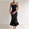 b301dd5a-87a7-428a-9331-5b36e8fe06b7.jpg فستان ضيق بدون أكمام وخصر مرتفع وحافة مكشكشة