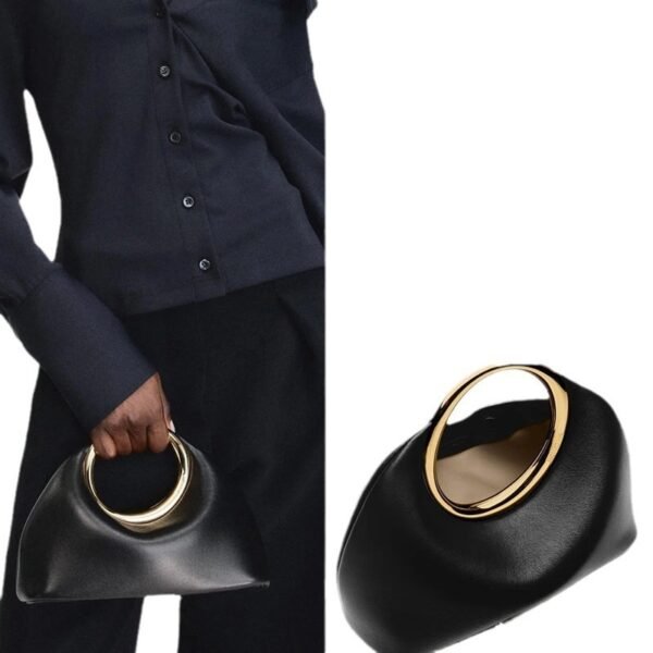 bfc03d12-75dc-483e-9db8-1ce68b3f9f23.jpg حقيبة جلدية ناعمة بسيطة مع حلقة حمل يدوية