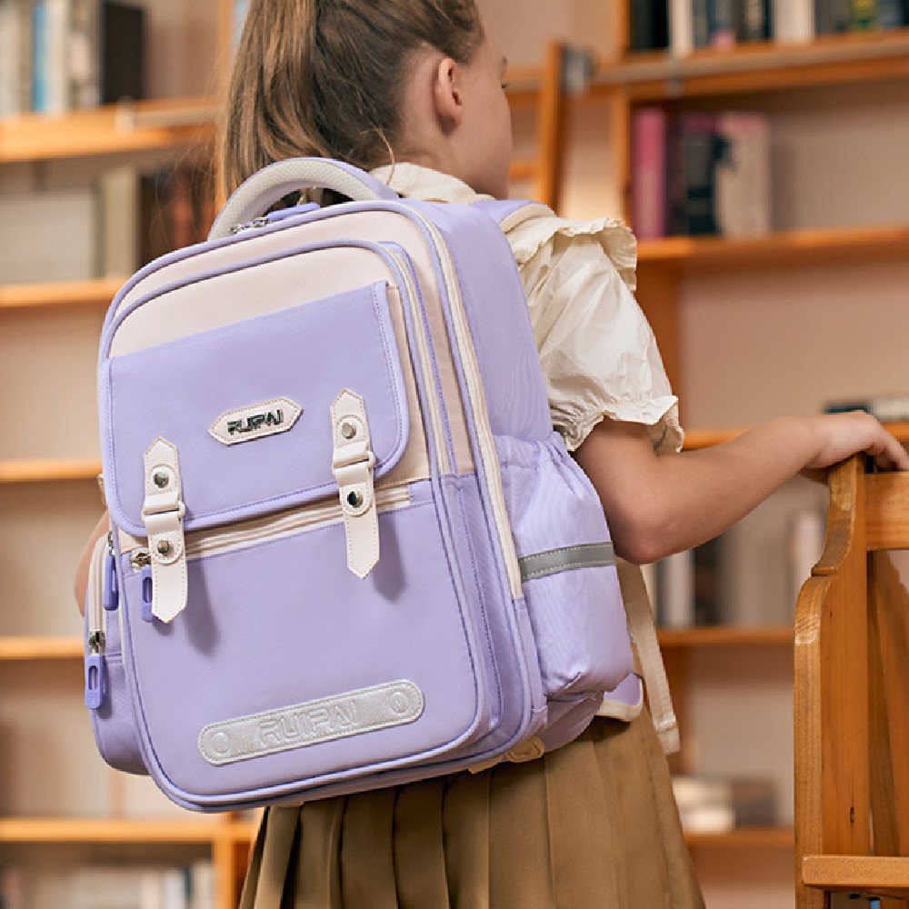 حقيبة مدرسية للأطفال ذات سعة كبيرة ومقاومة للماء ومصممة لحماية العمود الفقري