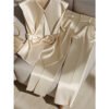 5f6ed5d1-de77-4141-b5f5-7391ffe23c44.jpg طقم بلوزة وبنطال شبابي أنيق على الطراز الغربي بلون الشمبانيا