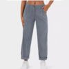 1926b228-98ef-4a04-b715-4c206c86353a.jpg بنطلون نسائي كاجوال عالي الخصر بلون سادة فضفاض مستقيم