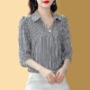 1db6b91a-b7f0-4b13-bd1f-23c8b99459e2.jpg قميص شيفون مخطط ملابس نسائية