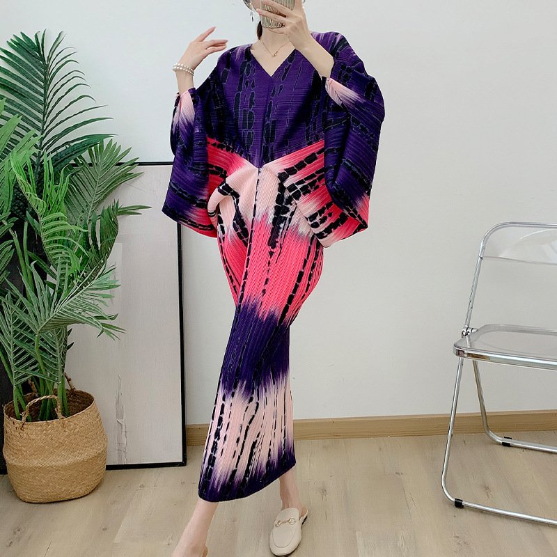7e157dfa-4b18-449a-bd58-8ef91c3a35a4-1.jpg فستان نسائي بأكمام خفاش مطوية