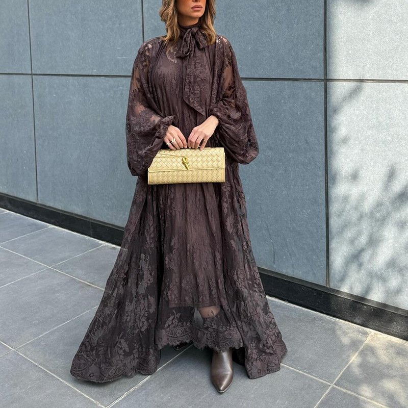53c88a87-78b6-47dd-999b-7a8887f6bf72.jpg فستان طويل الأكمام فضفاض مكشكش مطرز على الطراز الفيتنامي، متين وثقيل الوزن