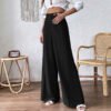 بنطال واسع الساقين فضفاض بخصر عالٍ، مناسب للإطلالات الكاجوال