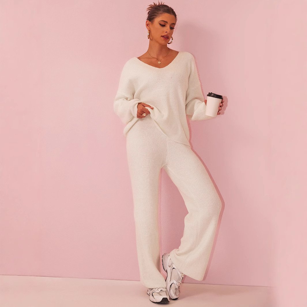 بدلة طويلة الأكمام محبوكة بخطوط غائرة ومصقولة