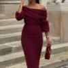 fbd9e431-47a7-44fc-919c-b0850f769c41-4.jpg طقم قطعتين من Pure Desire Style، بلوزة مكشوفة الكتفين بقصة ضيقة وتنورة طويلة