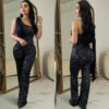 b3b08415-ad4a-4c4e-a784-957ab2fce650.jpg جمبسوت نسائي بلون سادة بدون أكمام بكتف واحد مزين بالترتر
