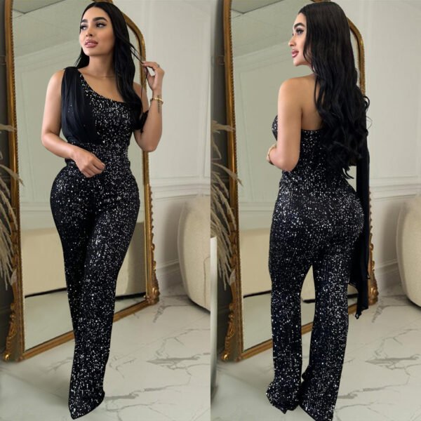 b3b08415-ad4a-4c4e-a784-957ab2fce650.jpg جمبسوت نسائي بلون سادة بدون أكمام بكتف واحد مزين بالترتر