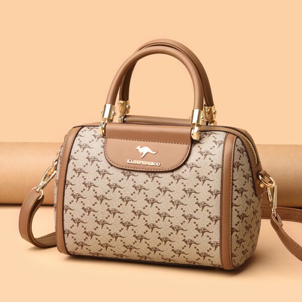 e13b6a6f-26e9-4a41-9d69-fca44e2d1412-1.jpg حقيبة كتف نسائية أنيقة مطبوعة