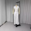 31f9c7d6-45c8-4961-a4ec-ccd20385d99e.jpg جمبسوت ضيق بدون أكمام بياقة منخفضة بلون موحد