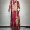 b9720bd7-d994-45a5-b9d6-35c0ee300ee9.jpg فستان مطرز بخيوط من الترتر الذهبي